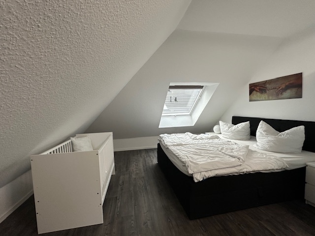 Schlafzimmerbereich Dachgeschoss Landhaus Seewind